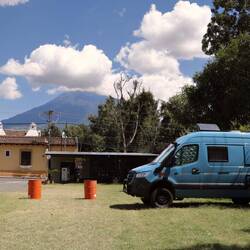 Parking/camping site in Antigua, with "Volcán de Agua" in the distance.