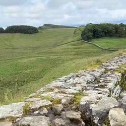 Video of Hadrian's Wall stretching into the distance and the ruined Roman fort