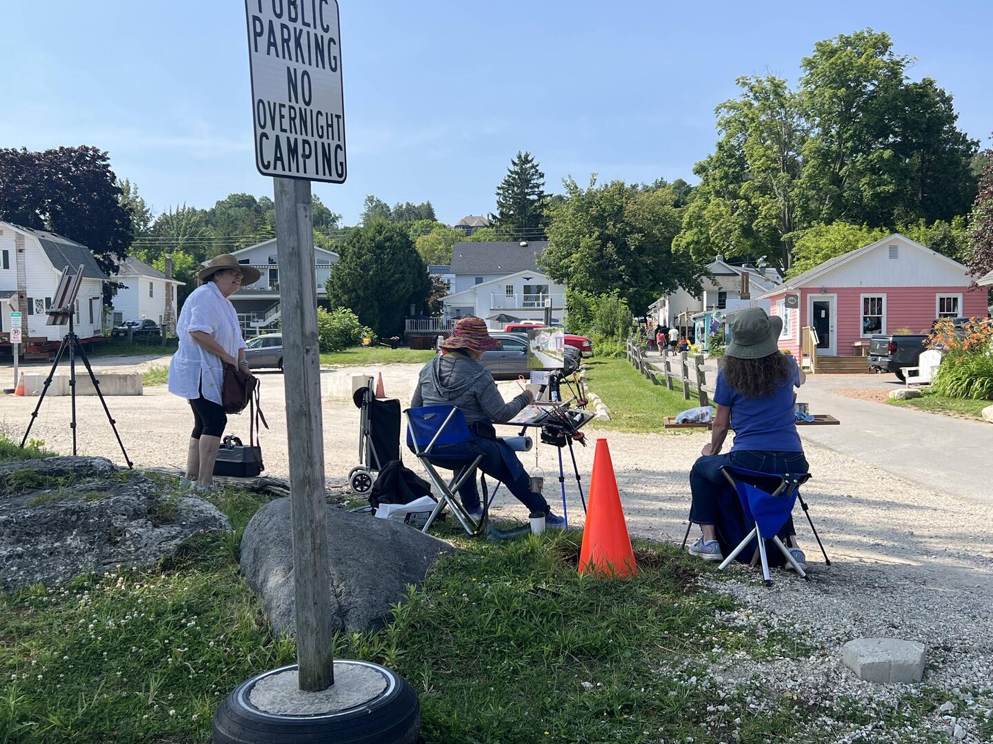These folks were drawing the street and cafes in front of them. In Fish Creek next to the Town Dock.
