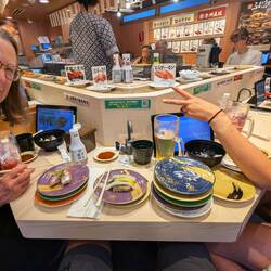 Conveyor belt sushi ... dangerous! Our most $$ meal yet