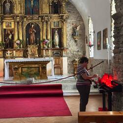 Grace found a church with real candles!