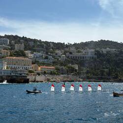 Kids learning to sail being towed along, very cute