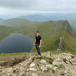 Chris is pleased to have made it to the view!