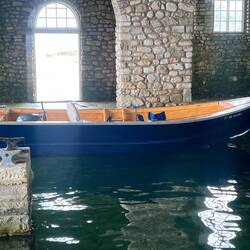 Inside Boathouse. A Mennonite man built this beautiful wooden boat. He and his wife come over often