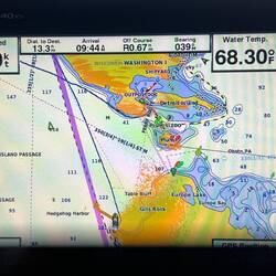 My chartplotter shows our crossing Death's Door. (Radar is on, so also shows some showers.)