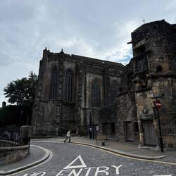 A rundown church and abbey in the center of town