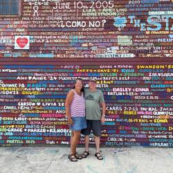 Standing in front of the barn.