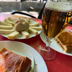 Awesome lunch today. That's local cheese and empanadas with, yes, beer.