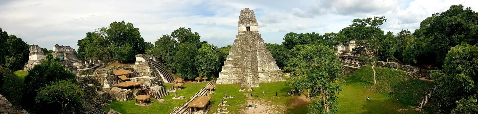 Panoramic view of the main square with the Temple of the Jaguar in the center, Tikal.