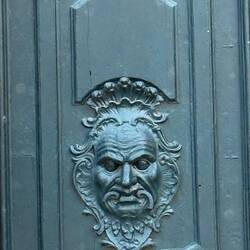 Door on monastery. This face is huge.