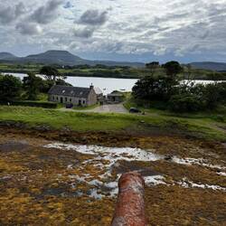 On the battlements; this cannon had a good line of sight on the loch