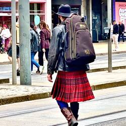 Robin rocking a kilt & cowboy boots