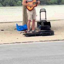 Very talented musician. Should've had my Uke with me.