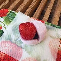 Strawberry wrapped in mochi with sweet red bean paste