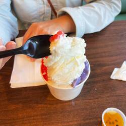 Lychee ice with popping boba and taro pudding