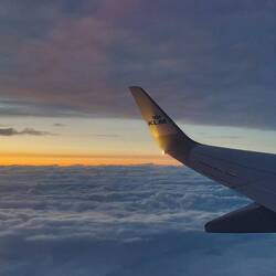 Sonnenuntergang über den Wolken