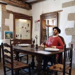 The tithe collector at his desk