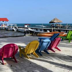Colorful sun loungers on the beach.