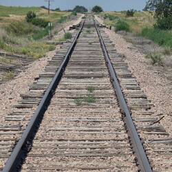 Apparent 1800's train track prior to development into the gravel cowboy trail