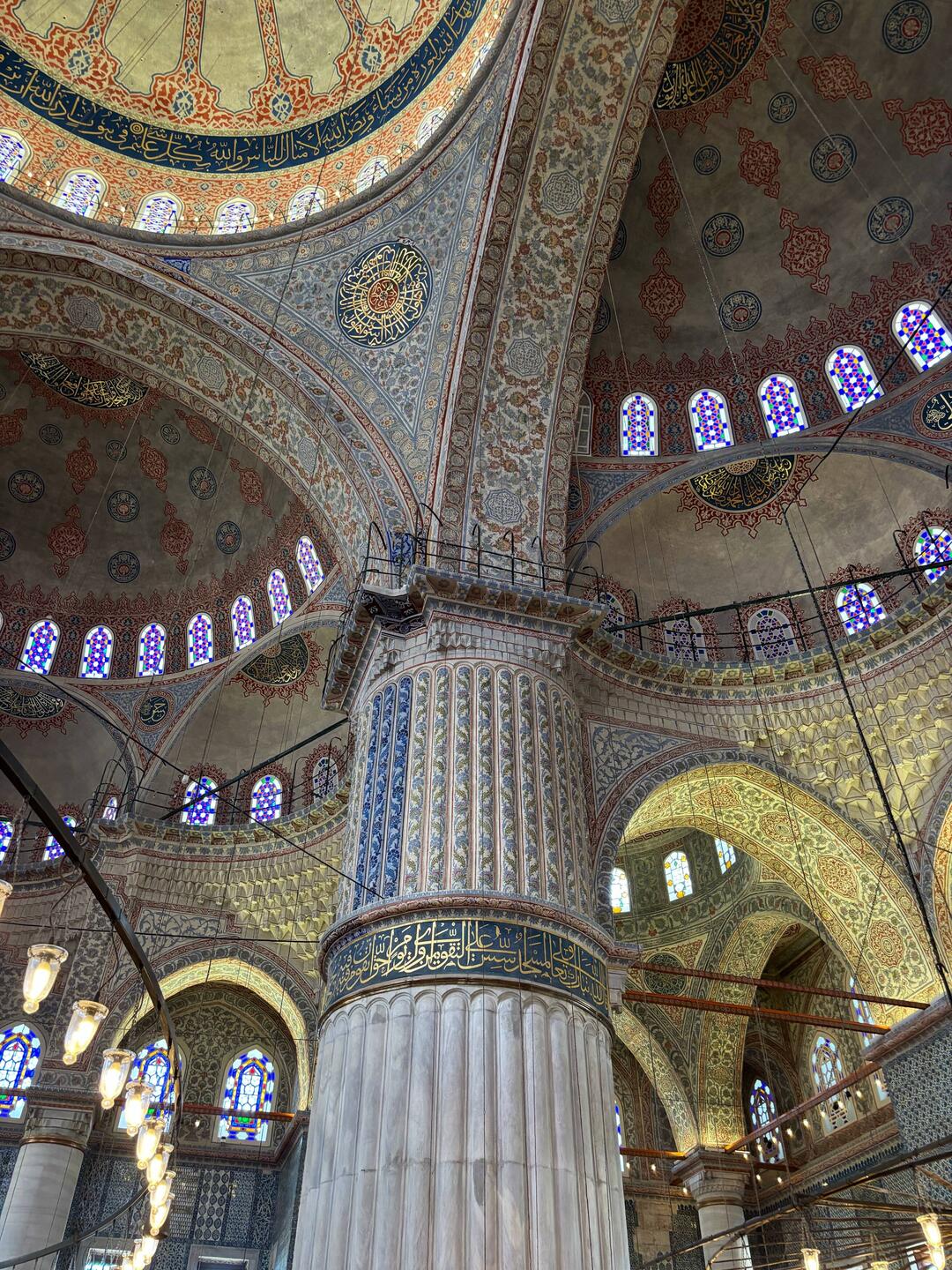 Note the few blue tiles inside the mosque