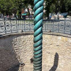 A cauldron used to sit atop the there intertwined snakes
