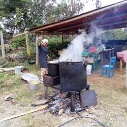 Several generations of cooks had been making this caldron of soup over an open wood fire all day.