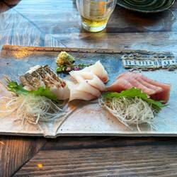 Sashimi served on a customs ceramic platte for the "locally sourced" restaurant at the base of the b