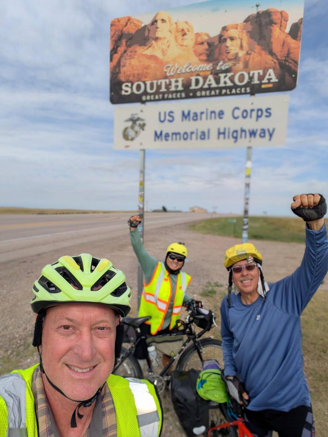 The team crossing into South Dakota. Chris, Ger and Bo