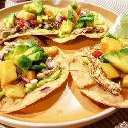 Tacos with chicken, mango, avocado, onion and guacamole. Mexico is almost here!