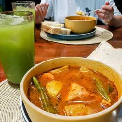 Excellent Creole-inspired soup, with chicken and vegetables, spicy. And cucumber juice.