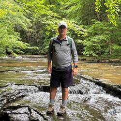 Kevin pretending to stand on water