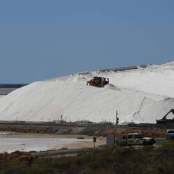 Bulldozer working the salt pile