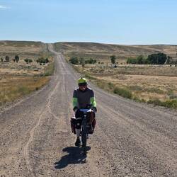 Ger climbing dirt road incline.