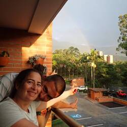 Enjoying the farewell double rainbow from Leticia's balcony.