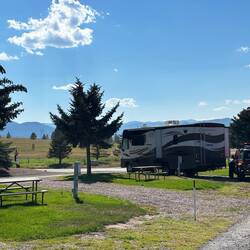 We have a nice view of an open dog park field