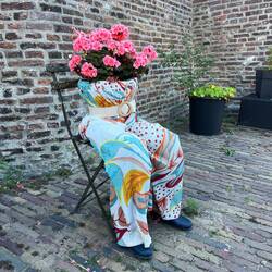 "Blumenfrau" am Wegesrand