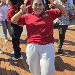 Ayu won this competition where you have to gather coins using your teeth from a hanging ball.