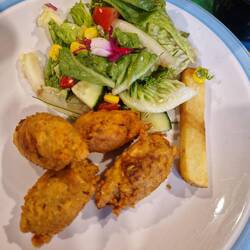 Homemade falafels and salad with fuscia flower for tea after the visit to A&E