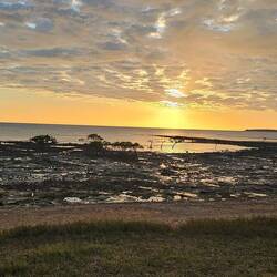 Early morning. Tide half way in.