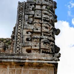 Carved detail representing Chaac, the rain god.
