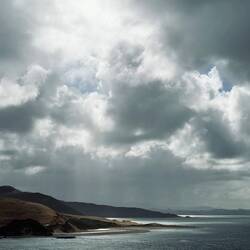 Break in the clouds over Orongotea Bay