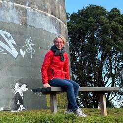 Amanda (and adoring hound) on Te Tatua-a-Riukiuta (Mt. Roskill)