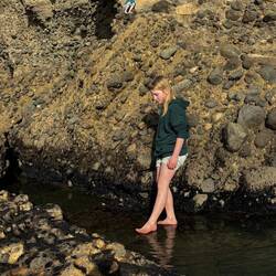 Perspective. Tilda is younger, farther away & smaller, whereas Riley is older, taller & much closer!