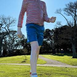 Boy Walking by Ronnie van Hout depicts a larger-than-life child strolling into adulthood