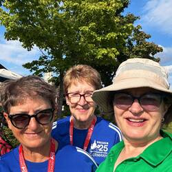Two members of the golf club as Volunteers for the competition