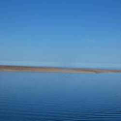 Sea so calm it's almost a mirror.