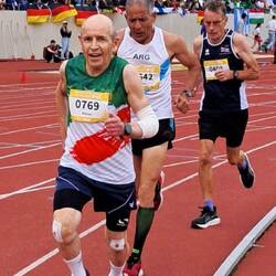 John "Legend "- bruised, battered- silver in 1500m