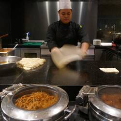 The toss and turn of roti bread production