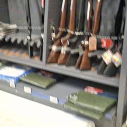 Guns sold in the shop next to the food