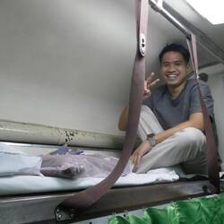 James from the Philippines slept above John